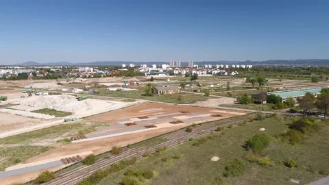 Flight above field and construction sites in Mannheim Video stock 144821020