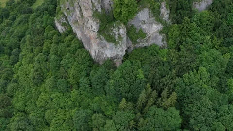 Flight above forested rocks under High Tatra mountains, Slovakia. Stock Footage 137437923