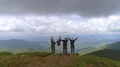 The flight above four people on the beautiful mountain 4k or 4k+ Resolution