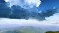 The flight above the four people on the mountain 4k or 4k+ Resolution