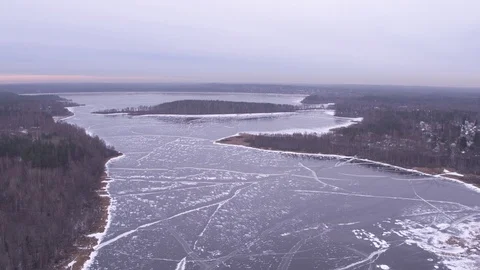 Flight above frozen lake 動画素材 123770376