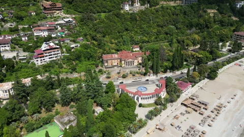 Flight above Gagra soviet colonnade Abkhazia best tourist attraction. Aerial Stock Footage 252818626
