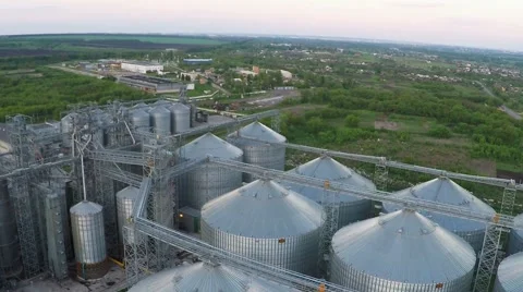 Flight above granaries and elevators in summer - aerial survey Video stock 68990787