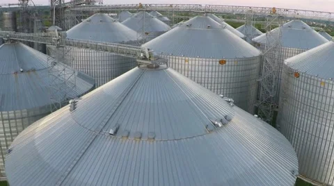 Flight above granaries and elevators in summer - aerial survey Video stock 68990817