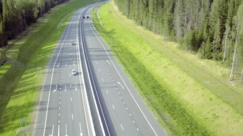 Flight Above Highway in Forest Stock Footage 66779770