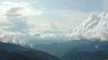 The flight above a man and woman on the mountain top 4k or 4k+ Resolution