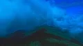 The flight above the mountain on a blue cloud stream background. Hyperlapse 4k or 4k+ Resolution