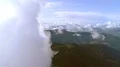 The flight above the mountain on a cloud background. Hyperlapse 4k or 4k+ Resolution