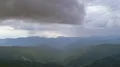 The flight above mountains against the beautiful cloud stream. Hyperlapse 4k or 4k+ Resolution