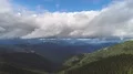 The flight above mountains on the cloud stream background. Hyperlapse 4k or 4k+ Resolution