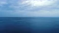 The flight above the ocean on the cloud flow background 4k or 4k+ Resolution