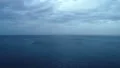 The flight above the ocean on the cloud stream background 4k or 4k+ Resolution