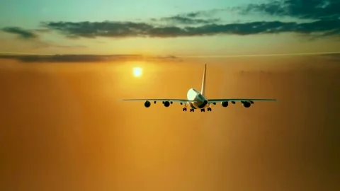 Flight above orange clouds making a contrail at sunset. Stock Footage 280219378