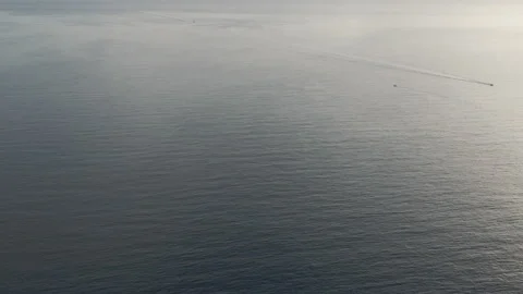 Flight above the Pacific Ocean coast Stock Footage 156525887