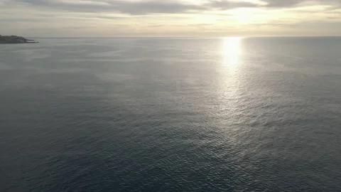 Flight above the Pacific Ocean coast Stock Footage 156526169