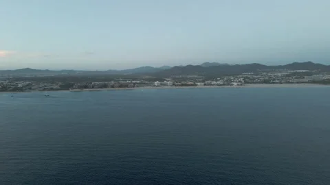 Flight above the Pacific Ocean coast Stock Footage 156527211
