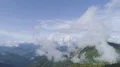 The flight above picturesque mountains on the cloud background. Hyperlapse 4k or 4k+ Resolution