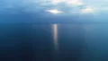 The flight above the picturesque sea on the cloud stream background 4k or 4k+ Resolution