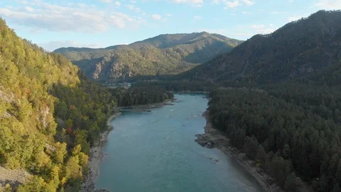 Flight above riverbed and mountain valley in summer day. Stock Footage 112364908