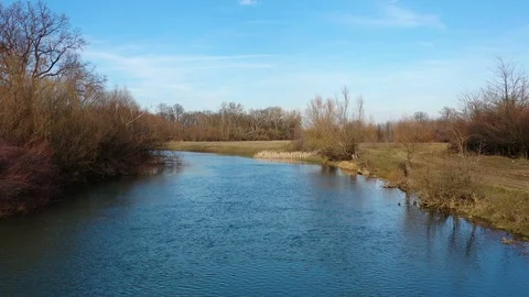 Flight above the small lowland river Video stock 125122906