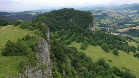 Flight above steep rock cliffs under High Tatras mountains Stock Footage 137437770