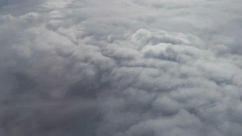 Flight above the stormy clouds in 4K Stock Footage 88303359