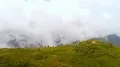The flight above the tent camp with people on a picturesque mountain 4k or 4k+ Resolution
