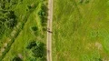 The flight above walking people in the mountain road. hyperlapse 4k or 4k+ Resolution