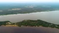 The flight above water and the island. quadrocopter shot, time lapse 4k or 4k+ Resolution