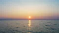 The flight above the water on the dawn background. drone shot 4k or 4k+ Resolution