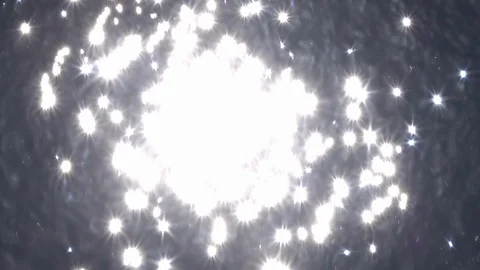 Flight above water surface with reflection of shining sun close up. Stock Footage 100236705