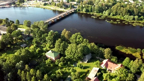 A flight across a bridge in a small town 動画素材 113132203