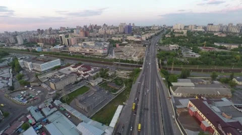 Flight across the city on the sunset Stock Footage 64372873