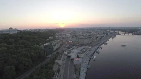 Flight across the city on the sunset Stock Footage 64373005