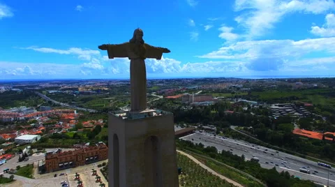 Flight aerial Christ the King statue Portugal Almada. City 4k video background. Stock Footage 65880702