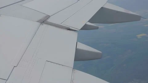 Flight from an airplane window Stock Footage 194923065