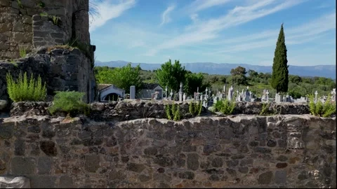 Flight in the Almendral de la Cañada cemetery and its ruined church Stock-Footage 278453462