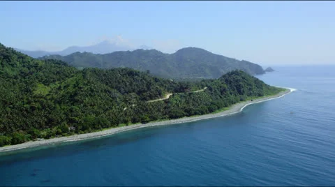 Flight along coast with beach and tropical forest Video stock 25333367