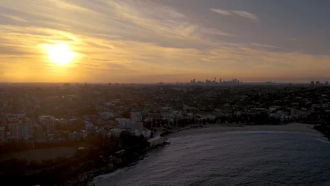 Flight along Coogee Beach at Sunset, Sydney, Austalia, 4K Stock Footage 105092279