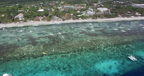 Flight along crystal clear water of white sand beach 스톡 동영상 45806873