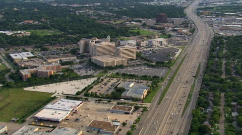 Flight along freeway past Memorial Hermann Hospital complex in Houston. Shot in Stock Footage 59510691