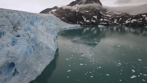 Flight along the glacier edge Stock Footage 96380982