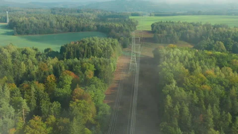 Flight along high voltage power lines and high voltage electric transmission Stock Footage 145974322
