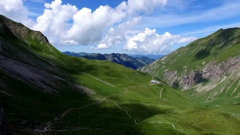 Flight along a hiking track backwards over beautiful scenery Stock Footage 108723544
