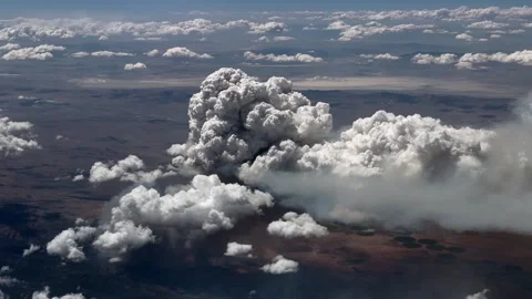 Flight along a massive forest fire in a wooded mountain region, with smoke Stock Footage 341278807