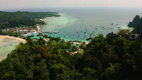 A flight along the mountain overlooking the bay Stock Footage 232233789