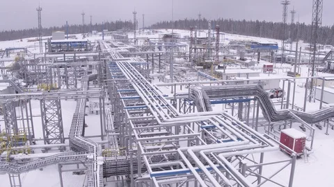 Flight along pipes on gas field Видео 123765005