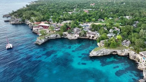 Flight along stunning rocky cliffs landscape in West End, Negril, Jamaica,  Stock Footage 255235344
