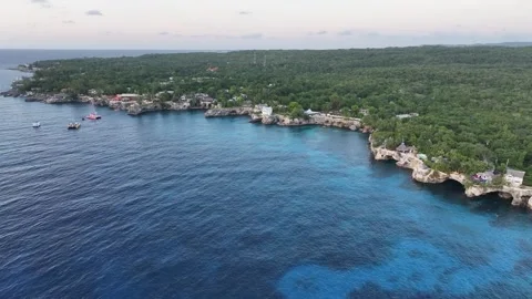 Flight along stunning rocky cliffs landscape in West End, Negril, Jamaica,  Stock Footage 255235382