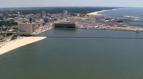 Flight along waterfront with wide view of Gulfport, Mississippi. Shot in 2007. Stock Footage 59507155